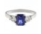 Olivia emerald cut blue sapphire and round diamond trilogy ring