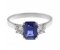 Rosaline emerald cut blue sapphire and round diamond trilogy ring