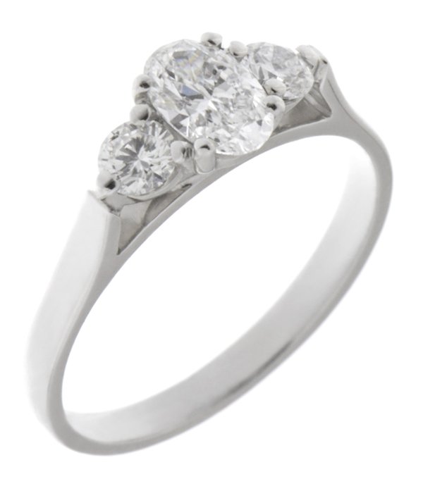 Olivia classic oval shape diamond and round brilliant cut diamond trilogy ring