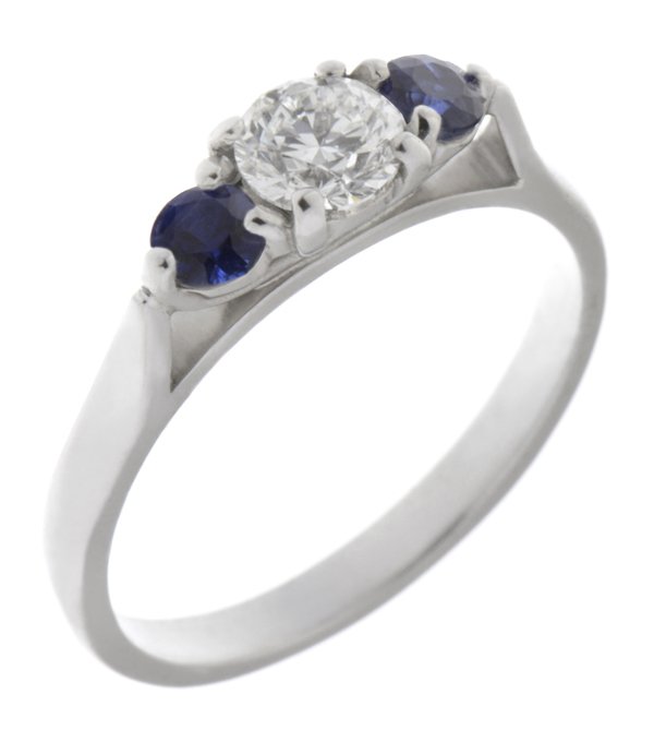 Olivia classic round brilliant cut diamond and round blue sapphire trilogy ring