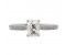 Kiss style radiant cut diamond solitaire engagement ring with grain set diamond shoulders