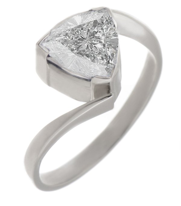 Modern trilliant cut diamond crossover ring