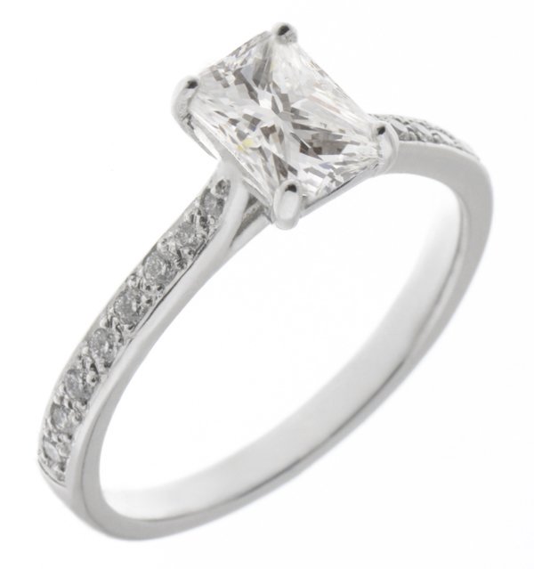 Kiss style radiant cut diamond solitaire engagement ring with grain set diamond shoulders