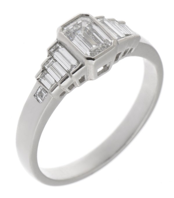 Art deco rubover emerald cut and baguette diamond engagement ring