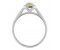 Classic claw set emerald cut yellow sapphire and round diamond halo cluster ring side view