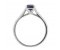 Kiss style round blue sapphire solitaire ring with grain set diamond shoulders side view