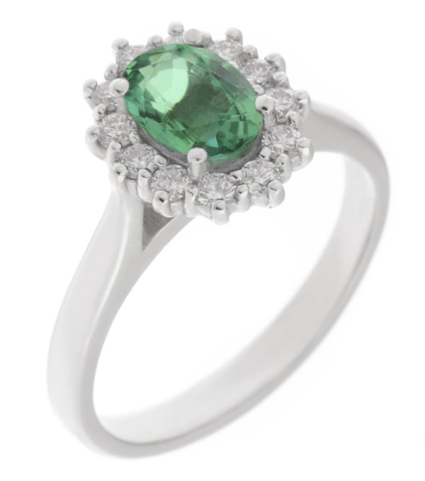 Crystal oval emerald and diamond halo cluster ring