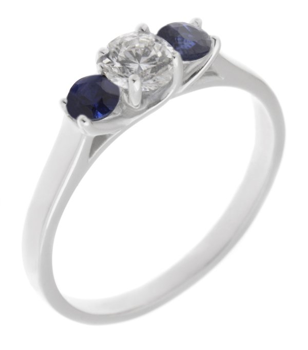 Vienna round brilliant cut diamond and blue sapphire trilogy ring
