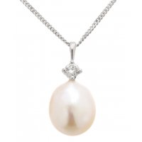 Oval freshwater cultured pearl and round brilliant cut diamond pendant