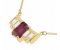 Art deco wing emerald cut ruby and baguette diamond pendant side view