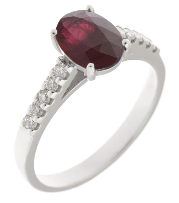 Bella classic oval ruby ring with round diamond set shoulders main image