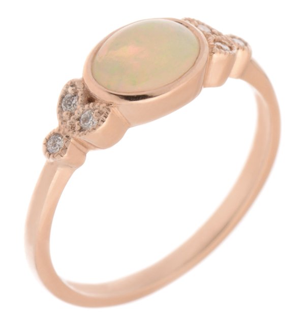 Vintage style oval opal and round diamond cluster ring main image