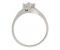 Princess cut diamond solitaire crossover ring with round diamond set shoulders side view