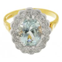 Classic oval Aquamarine and Diamond halo cluster ring