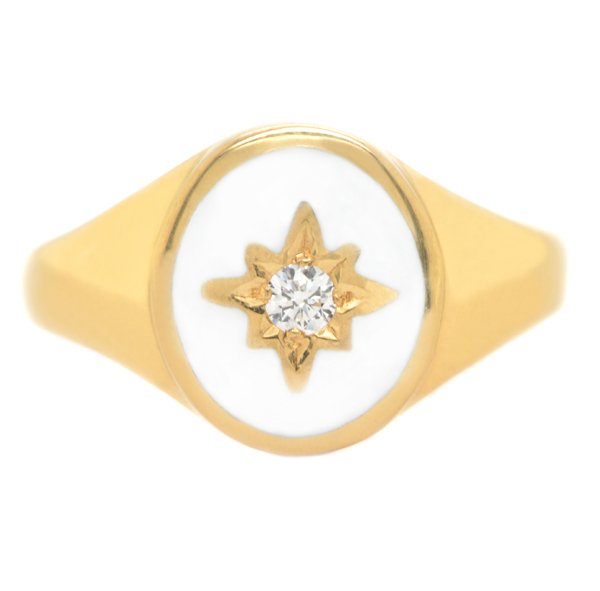 Oval white enamel and diamond star set signet ring top view