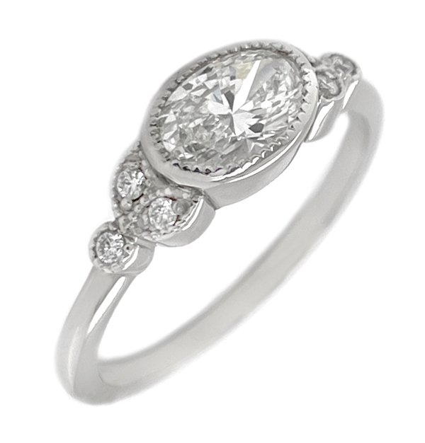 Vintage style Art Deco oval and round diamond engagement ring main image