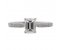 Kiss style Emerald cut diamond solitaire engagement ring with grain set diamond shoulders