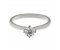 Classic twist style round brilliant cut diamond solitaire engagement ring