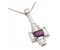 Art deco emerald cut ruby and baguette diamond pendant